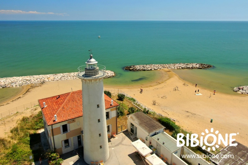 The View Of The Lighthouse On The Beach Of Bibione Bibione The View Of The Lighthouse On The Beach Of Bibione Bibione